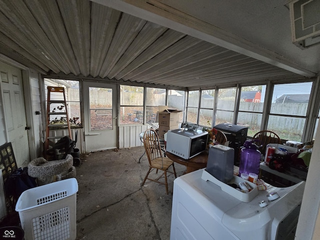 sunroom / solarium featuring washer / dryer