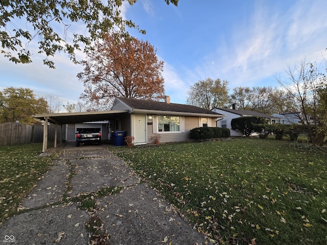 single story home featuring a carport and a front yard