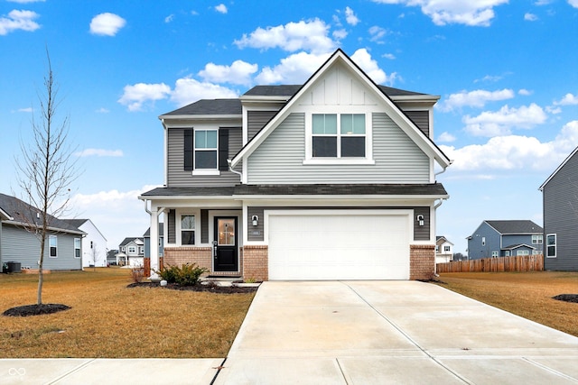 view of front facade featuring a garage, a porch, and a front lawn