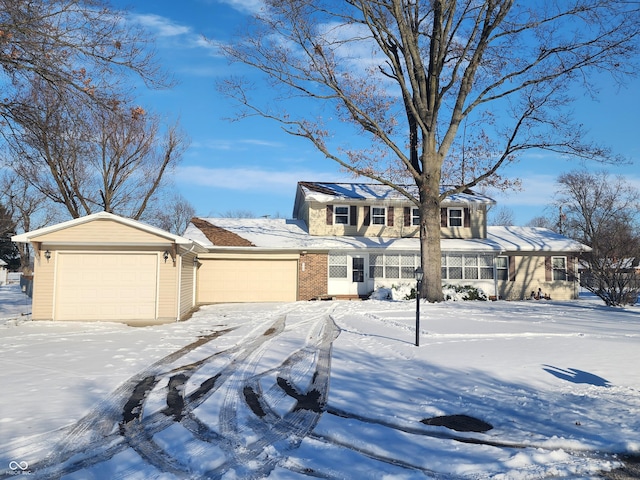 view of front of home with a garage