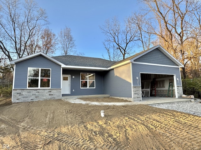 view of front of home with a garage