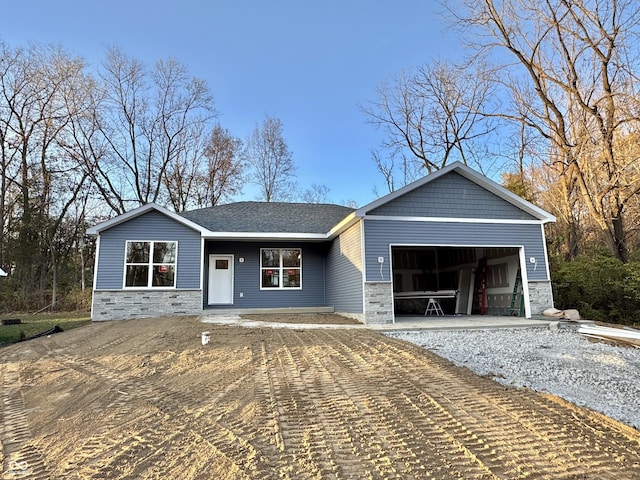 view of front of property featuring a garage