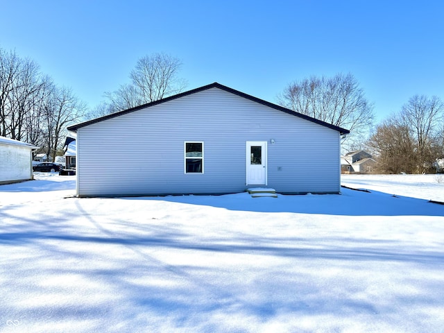 view of snow covered property