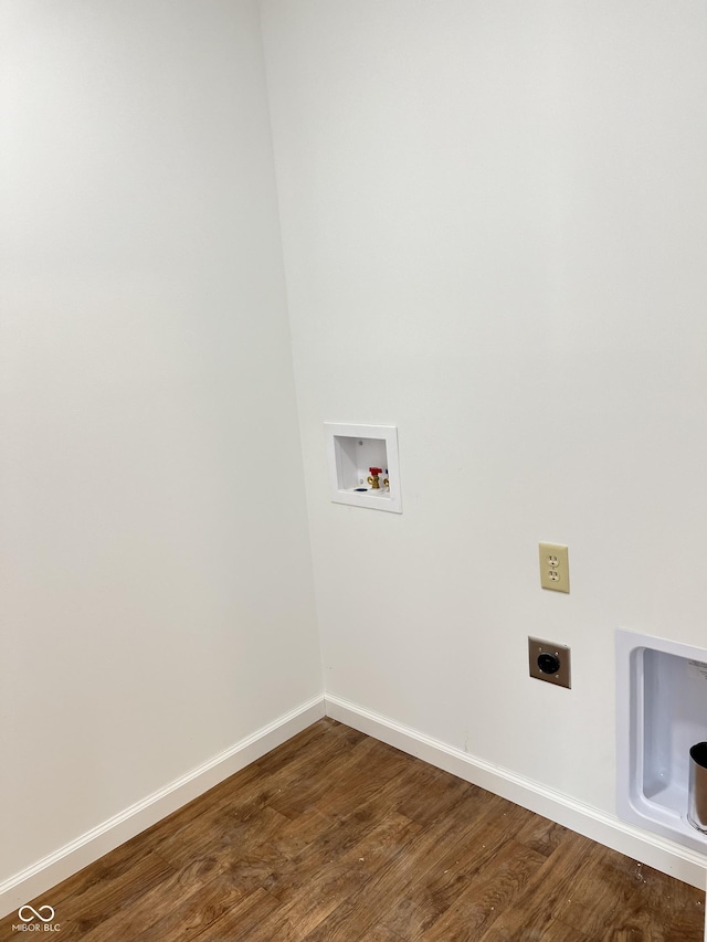 washroom featuring hardwood / wood-style floors, hookup for an electric dryer, and washer hookup