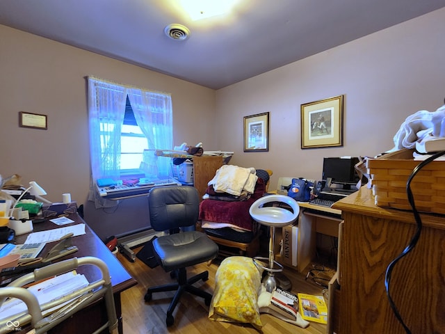 office featuring hardwood / wood-style flooring