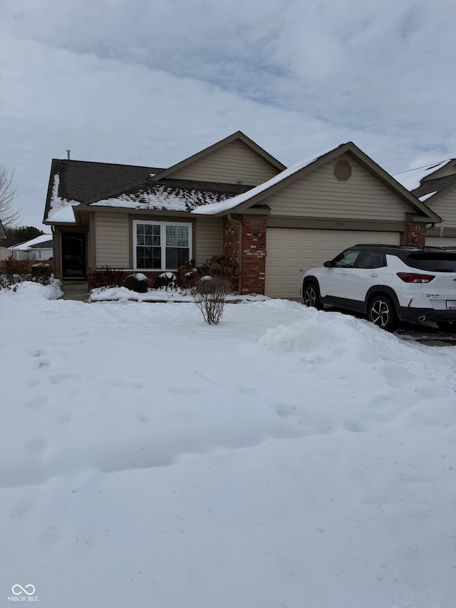 ranch-style house with a garage