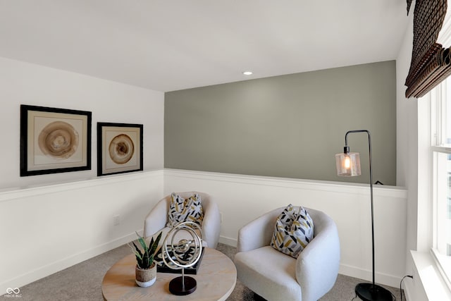 sitting room featuring carpet floors, recessed lighting, and baseboards