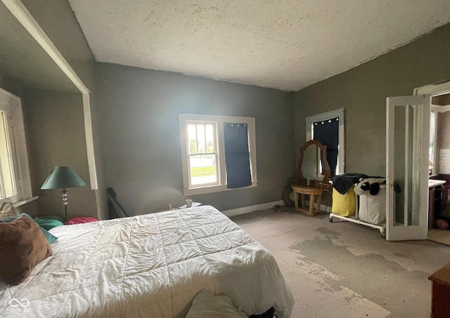 bedroom featuring a textured ceiling