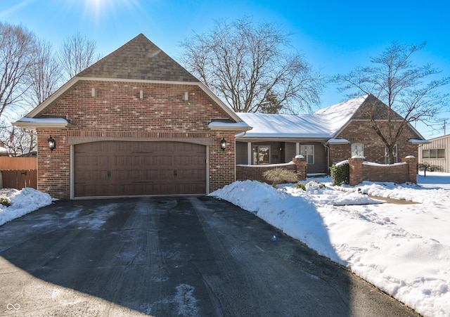 view of front of home with a garage