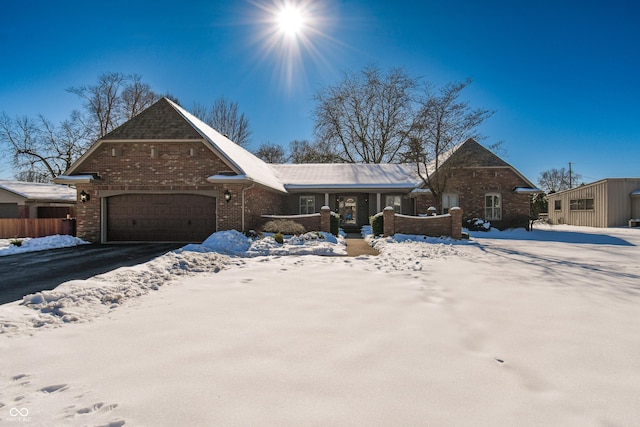 view of front of property featuring a garage