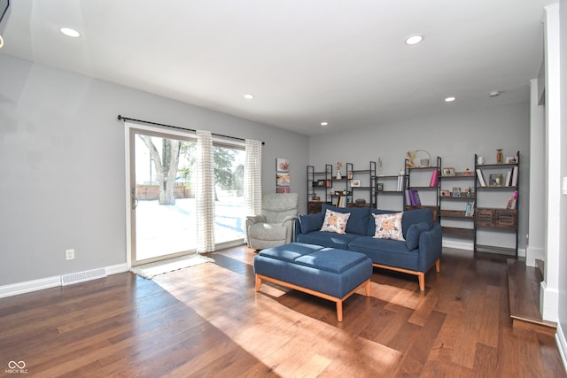 living room with hardwood / wood-style floors