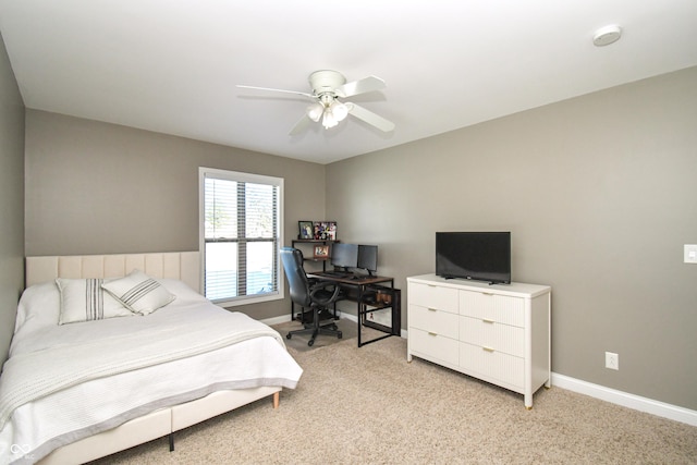 bedroom with light colored carpet and ceiling fan