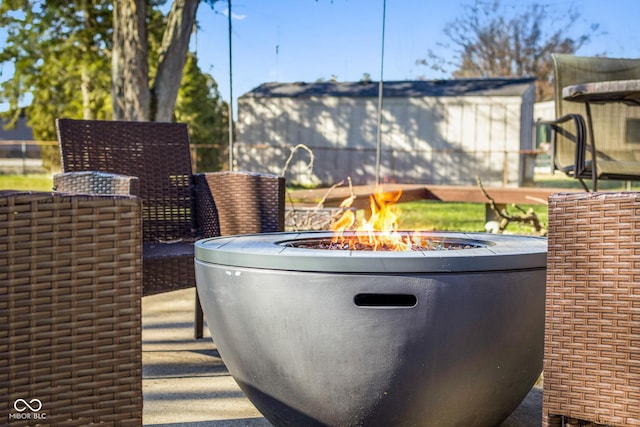 view of patio / terrace featuring an outdoor fire pit