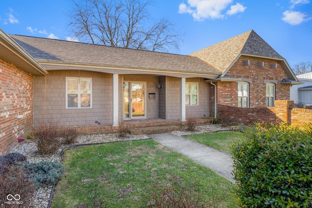 view of front of home with a front yard