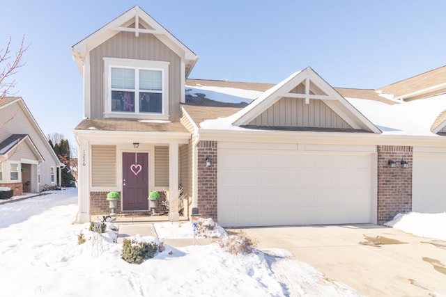 craftsman house with a garage