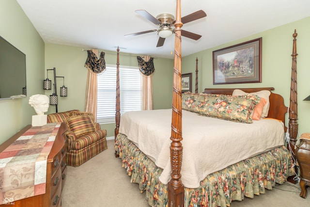 bedroom featuring light colored carpet and ceiling fan