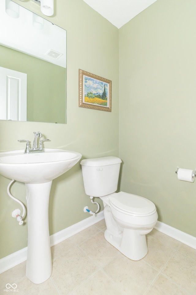1226 Arlington Dr, Greenfield, IN 46140 - bathroom with toilet and tile patterned floors