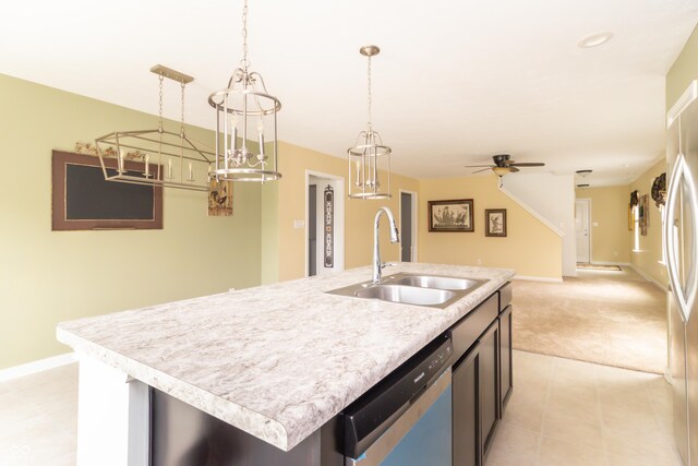 1226 Arlington Dr, Greenfield, IN 46140 - kitchen featuring appliances with stainless steel finishes, light countertops, a chandelier, and pendant lighting