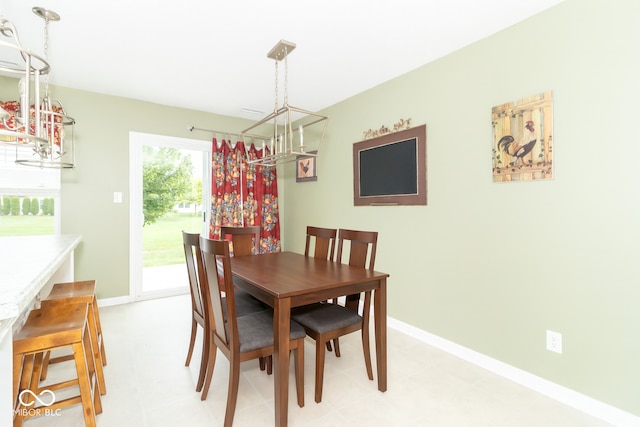 1226 Arlington Dr, Greenfield, IN 46140 - dining space with a chandelier and baseboards
