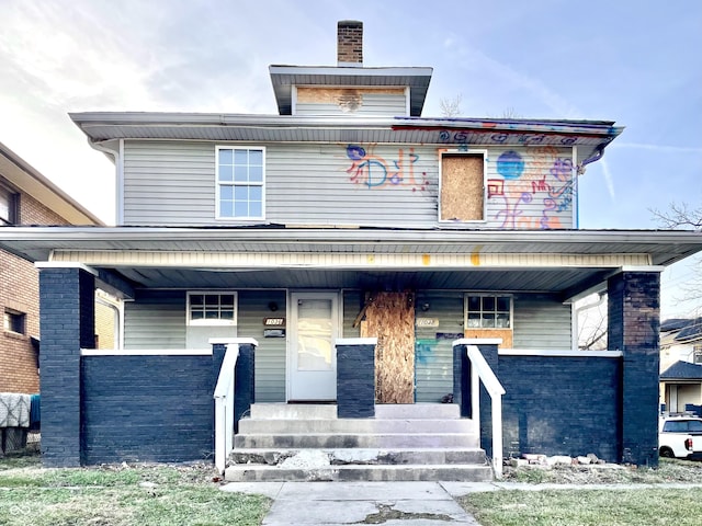 view of front of house featuring covered porch