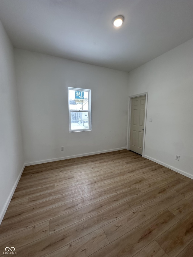 unfurnished room featuring light wood-type flooring