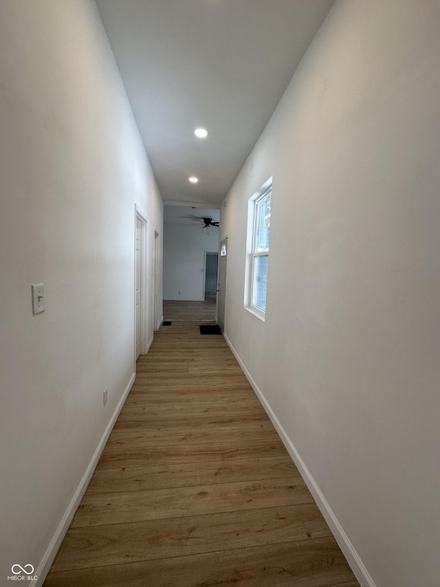 hallway featuring light hardwood / wood-style flooring