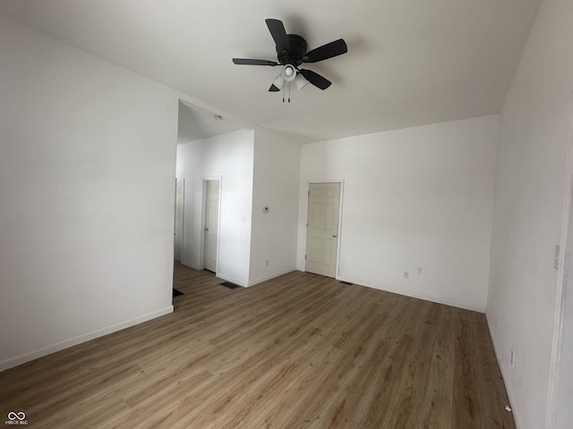 unfurnished room with light hardwood / wood-style flooring and ceiling fan