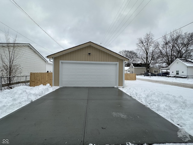 view of snow covered garage