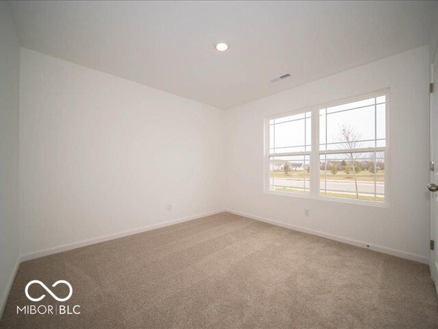 6618 Sulgrove Pl, Indianapolis, IN 46221 - carpeted spare room featuring baseboards, visible vents, and recessed lighting