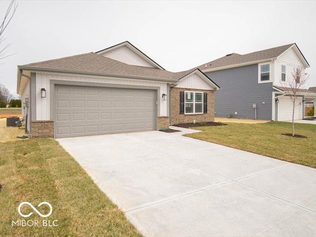 6618 Sulgrove Pl, Indianapolis, IN 46221 - view of front of house with a garage, concrete driveway, a front yard, board and batten siding, and roof with shingles