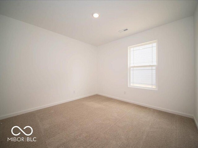 6618 Sulgrove Pl, Indianapolis, IN 46221 - carpeted empty room with recessed lighting, baseboards, and visible vents