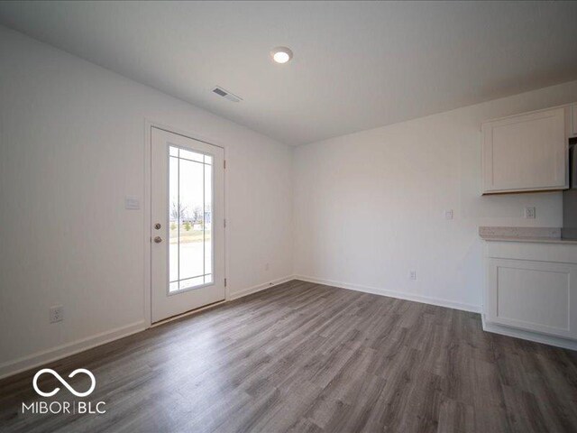 6618 Sulgrove Pl, Indianapolis, IN 46221 - interior space featuring baseboards, visible vents, and wood finished floors