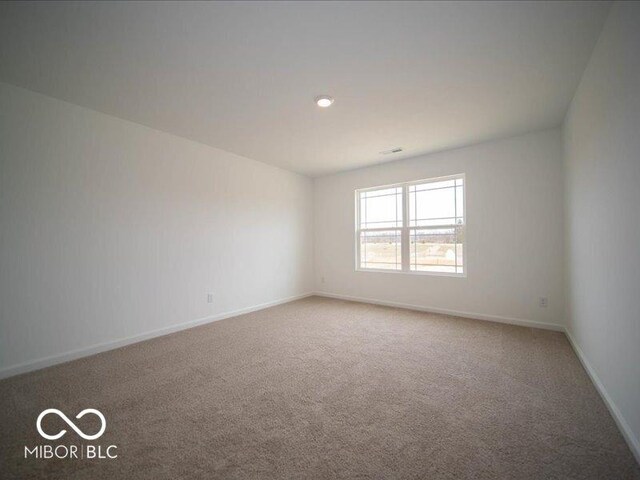 6618 Sulgrove Pl, Indianapolis, IN 46221 - carpeted spare room featuring baseboards