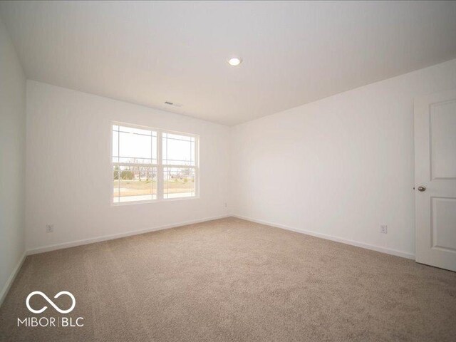 6618 Sulgrove Pl, Indianapolis, IN 46221 - spare room featuring carpet floors, baseboards, visible vents, and recessed lighting