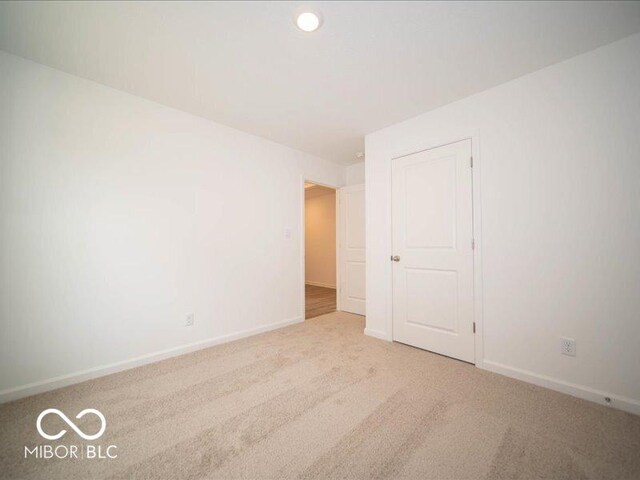 6618 Sulgrove Pl, Indianapolis, IN 46221 - unfurnished room featuring baseboards and carpet flooring