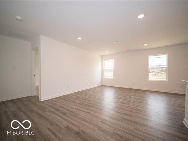 6618 Sulgrove Pl, Indianapolis, IN 46221 - empty room featuring baseboards, wood finished floors, and recessed lighting