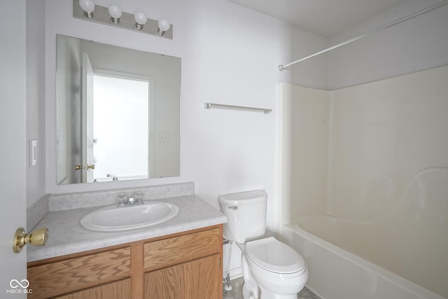 full bathroom with  shower combination, toilet, and vanity