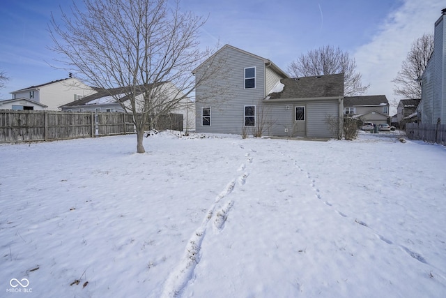 view of snow covered property