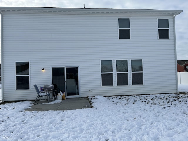 view of snow covered property