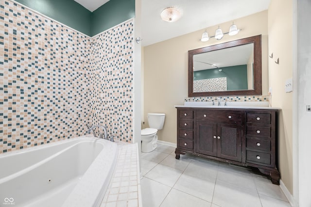 bathroom with toilet, a garden tub, tile patterned flooring, and vanity