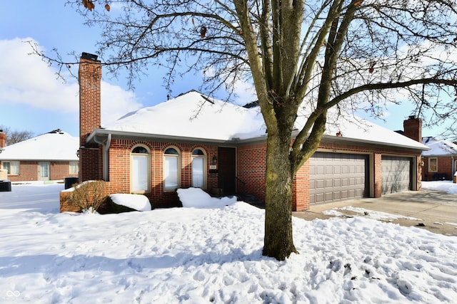 single story home with a garage