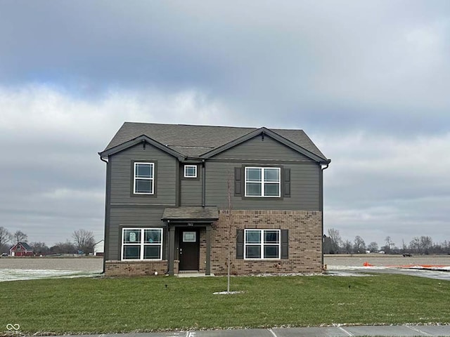 view of front of property with a front lawn