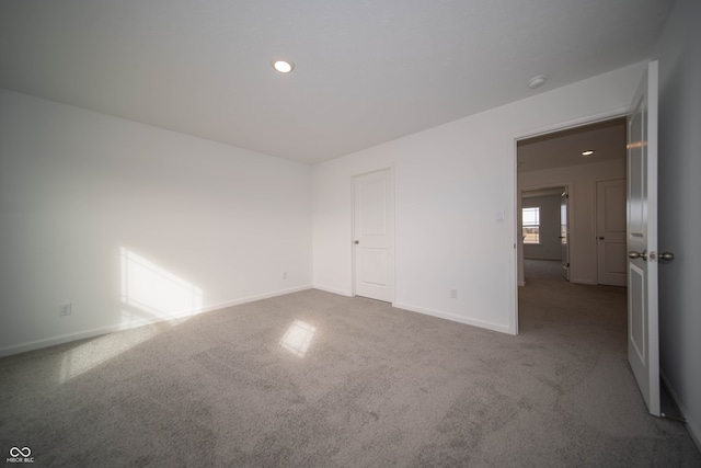 unfurnished room with carpet