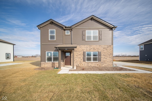 view of front of home with a front lawn