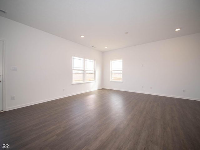 7872 Magnolia St, New Palestine, IN 46163 - unfurnished room with dark wood-style flooring and recessed lighting