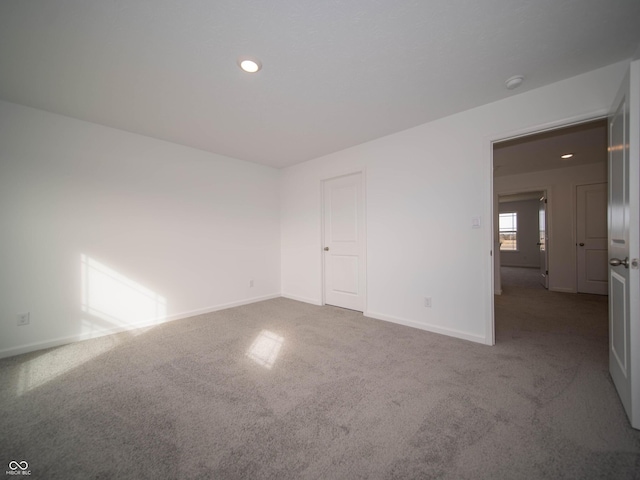 7872 Magnolia St, New Palestine, IN 46163 - empty room featuring carpet, a smoke detector, and recessed lighting