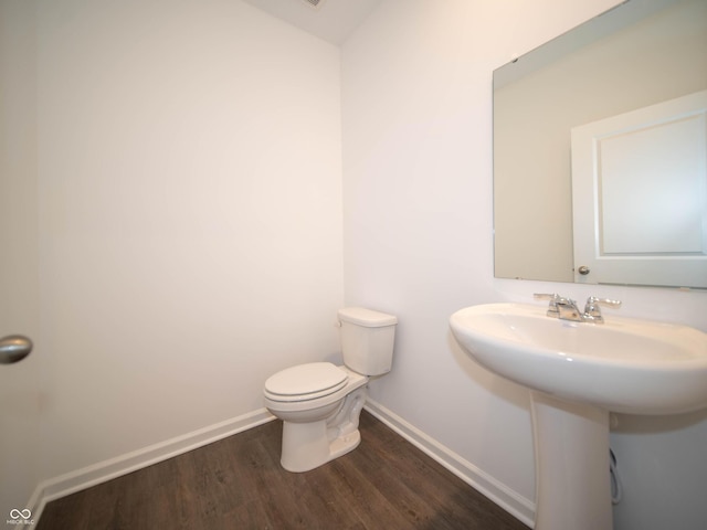 7872 Magnolia St, New Palestine, IN 46163 - bathroom with wood finished floors and toilet