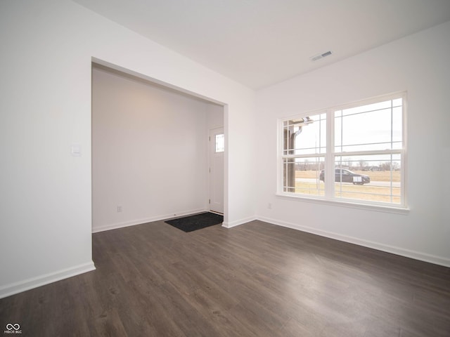 7872 Magnolia St, New Palestine, IN 46163 - unfurnished room with dark wood-style floors and baseboards