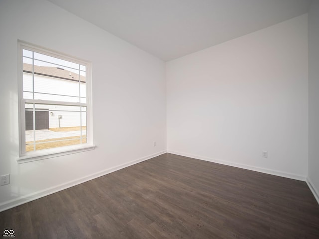 7872 Magnolia St, New Palestine, IN 46163 - unfurnished room with dark wood finished floors and baseboards