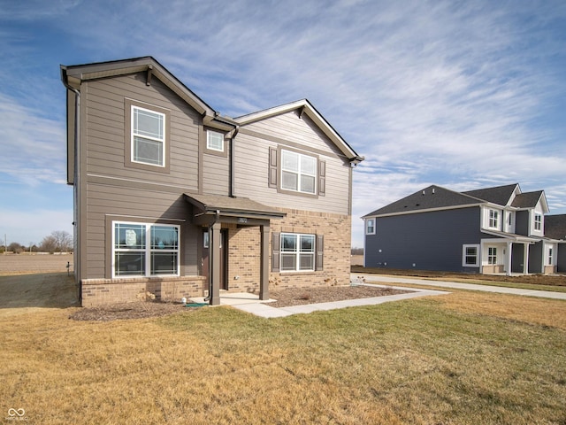 7872 Magnolia St, New Palestine, IN 46163 - view of front of home with brick siding and a front yard